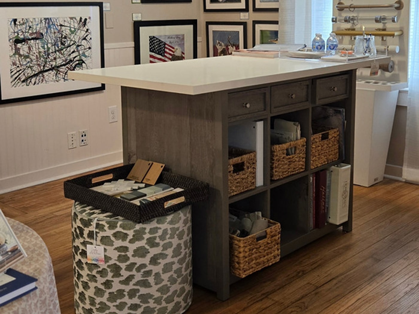 The new design area in the Langley Art & Home studio, with the gallery wall and design table